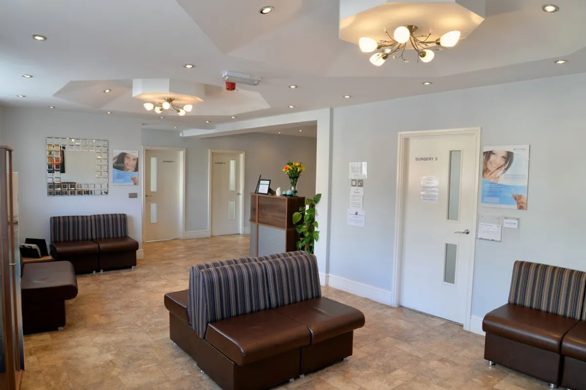 A bright waiting area opening onto the practice surgery doors